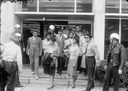 A picture of the members of the Tougaloo Nine being arrested outside the Jackson, Mississippi Public Library in 1961.